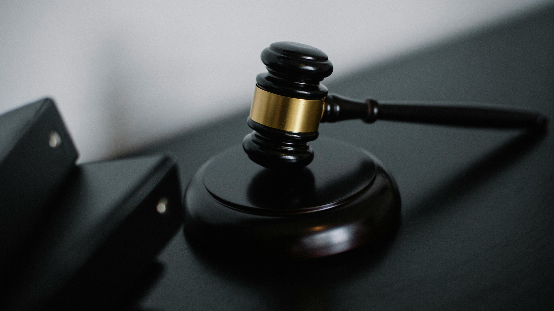 Image of a black courtroom gavel.