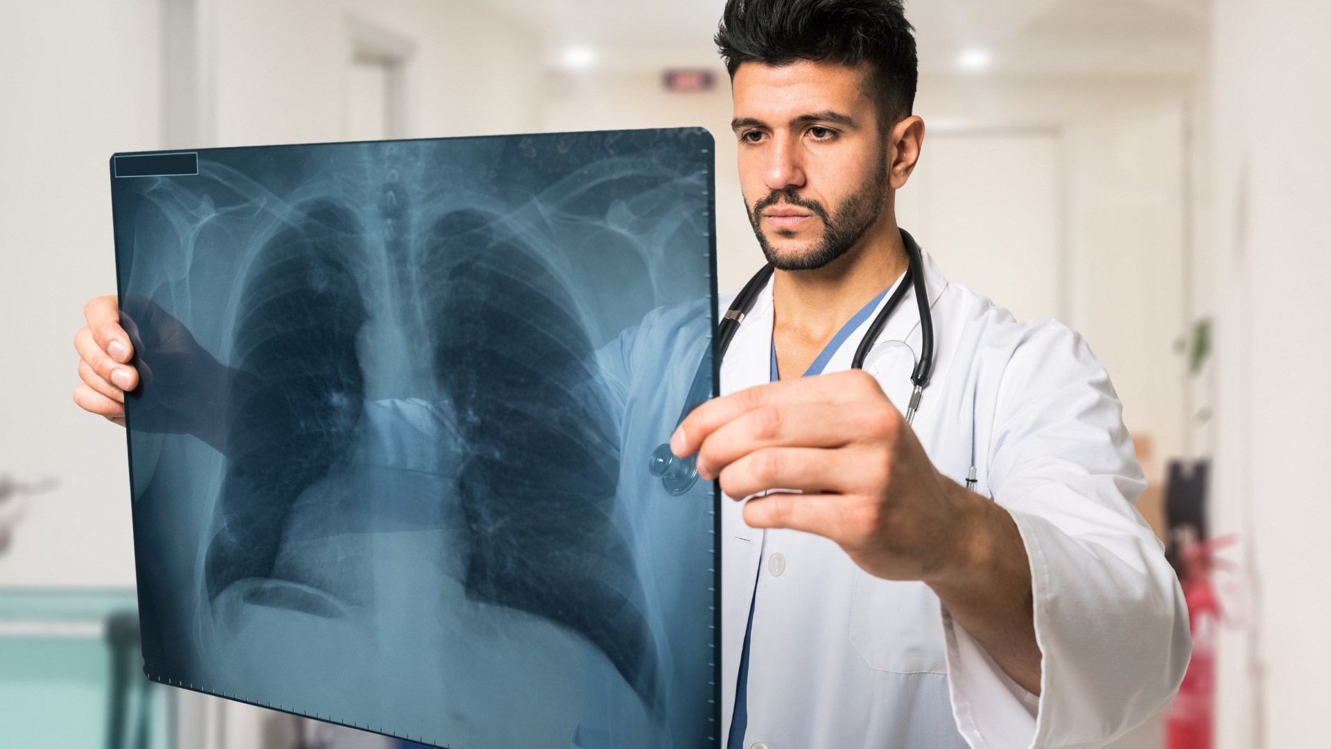 Doctor looking at scan.