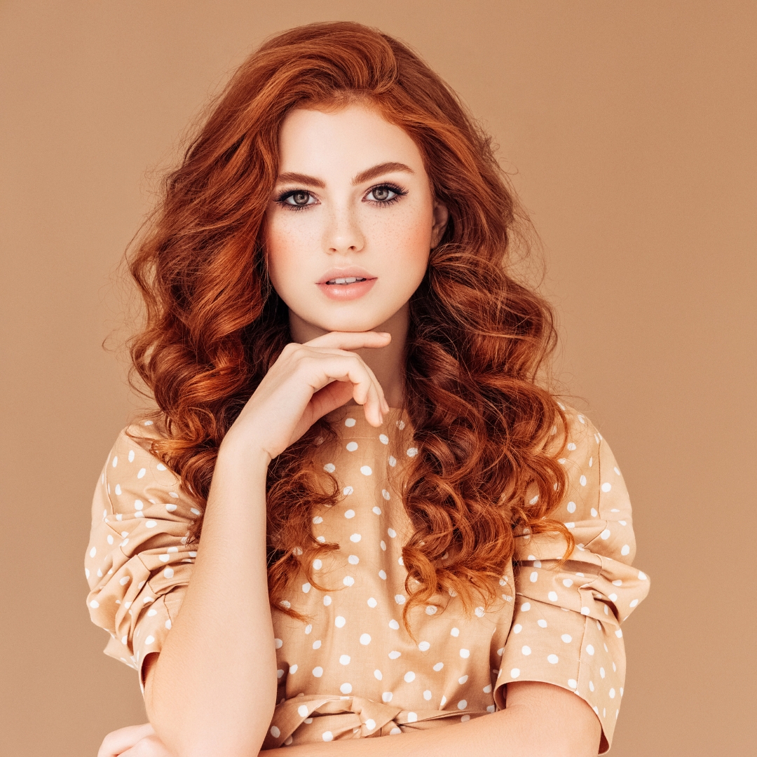 Model with makeup and hair done.